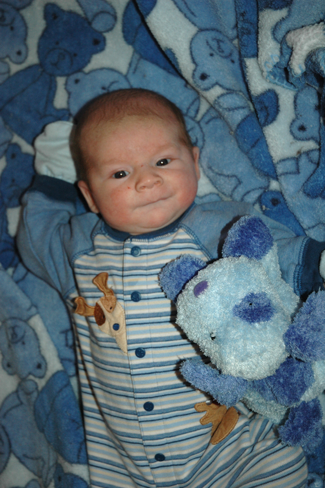 Henry cuddling with dog